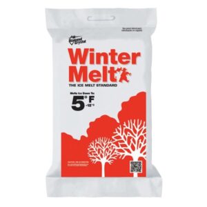winter melt de-icing rock salt. white package with red trees and white trees.