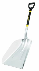 Scoop Shovel is large and metal, handle is black and yellow.