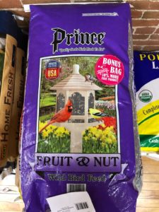 Prince Fruit nut mix, purple bag with images of cardinals at a bird feeder.
