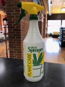 Photo of Delta Plantcare Trigger Sprayer, which is a utility trigger sprayer bottle in nearly opaque plastic and green and yellow writing.
